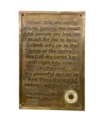 Bronze plaque with engraved text and Atlantic Records logo on a white background
