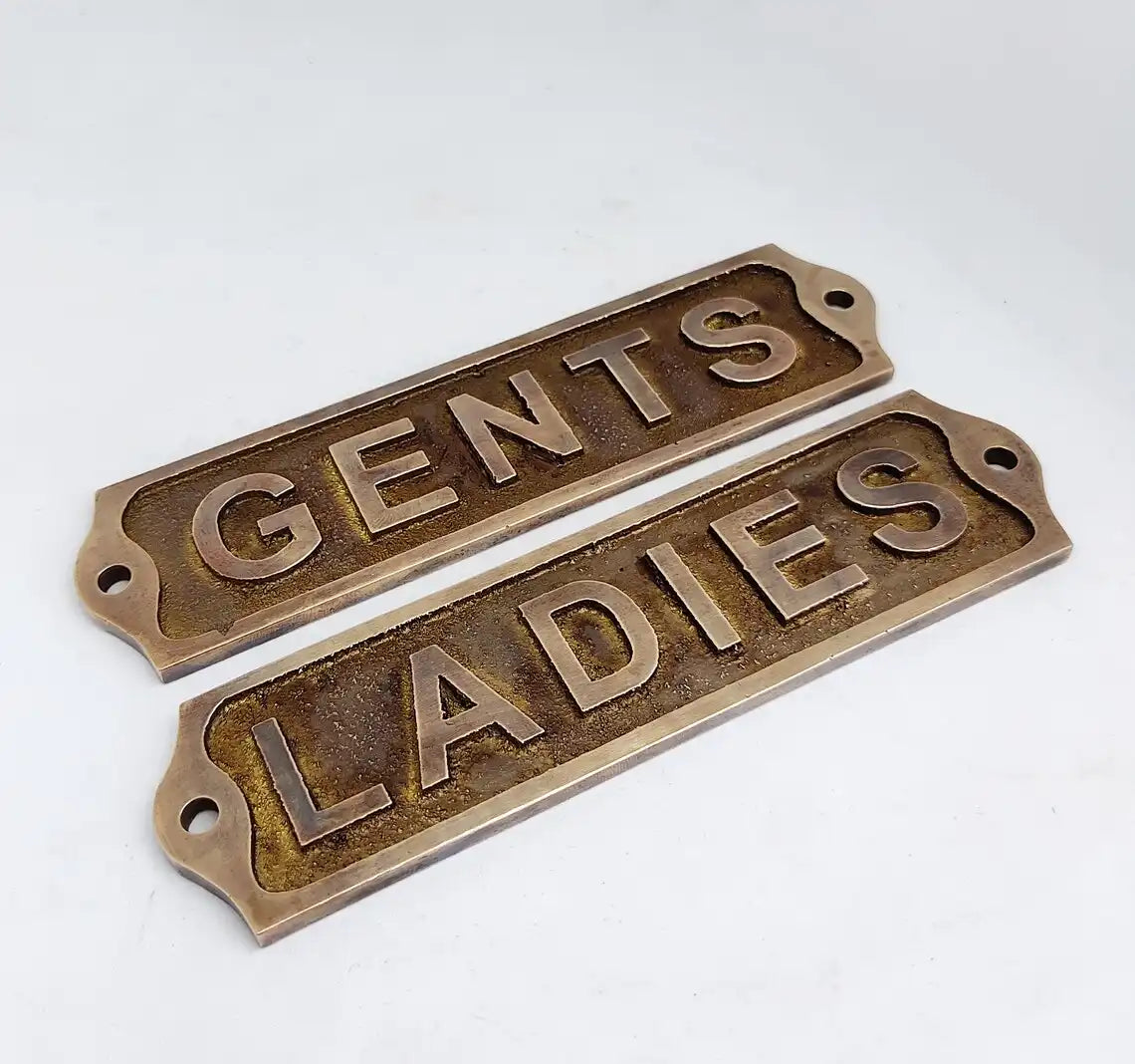 Polished brass restroom door plaques