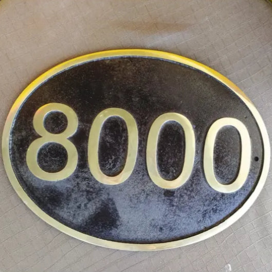 Weatherproof oval brass address plaque