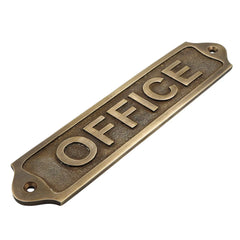 Bronze 'OFFICE' door sign on a white background