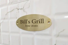 Oval brass plaques, custom engraved with your name and address