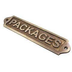 Bronze door sign with 'PACKAGES' text on a white background