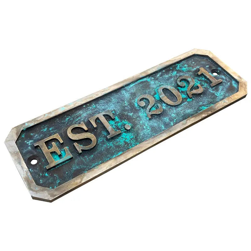 Personalized brass door sign patina texture
