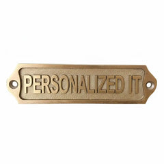 Brass door sign with 'PERSONALIZED IT' text on a white background
