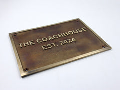 THE COACHHOUSE BRASS PLAQUE