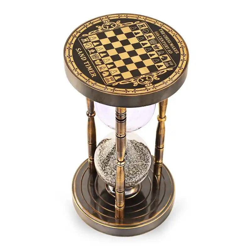 Hourglass timer with chessboard design on top, on a white background