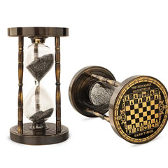 Hourglass sand timer with a chess-themed base on a white background