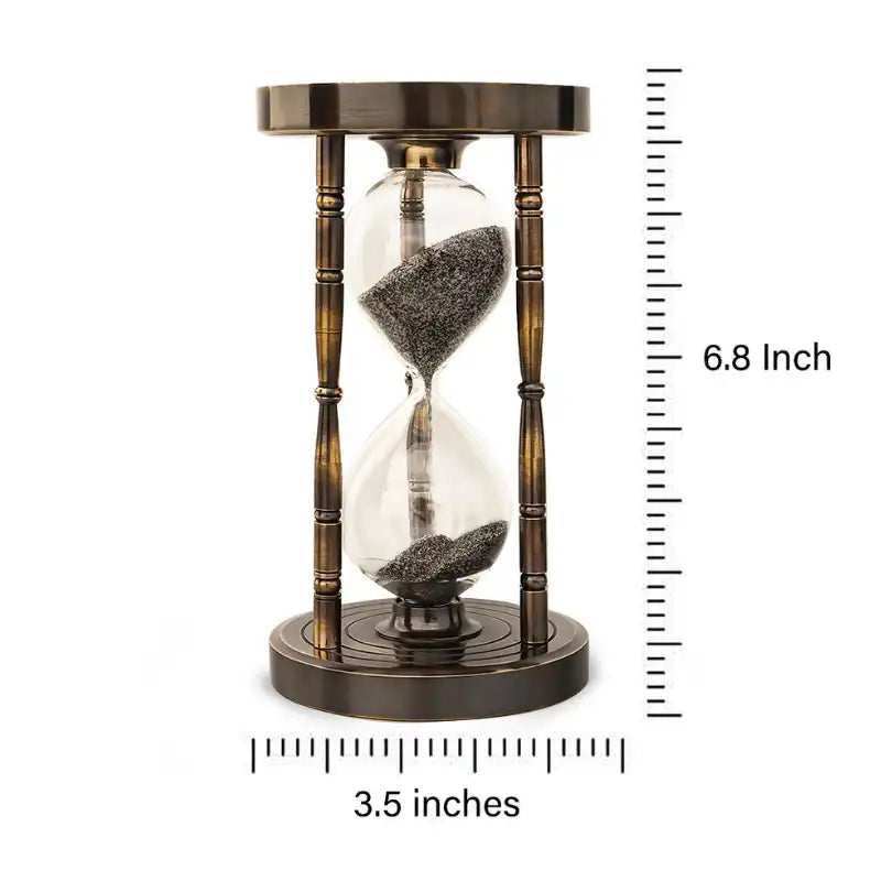 Hourglass with bronze casing and sand measurement on a white background