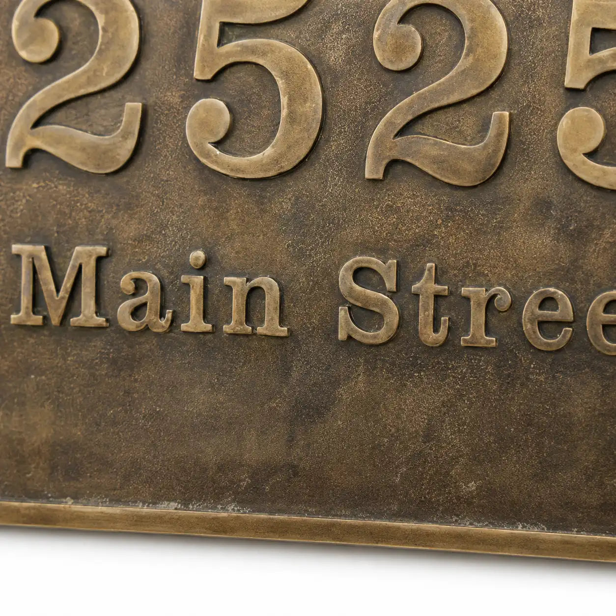 Brass oval house number plaque with precision engraved lettering