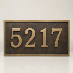 Custom brass sign with black and silver engraved lettering