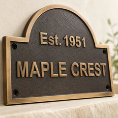 Custom bronze name and number plaque for homes with classic antique styling