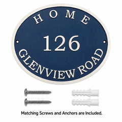 Personalized bronze oval address plaque displayed alongside included mounting hardware on a clean background.