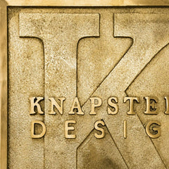 Custom brass address plaque with black and silver engraving