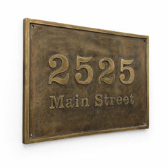 Weather-resistant oval brass address sign with custom engraving