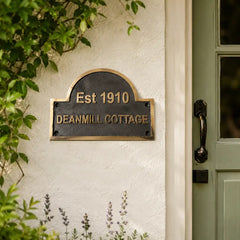 Bronze address plaque with personalized name and house number