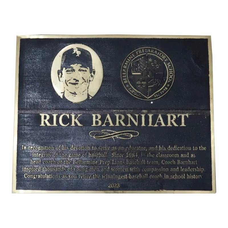 A black brass commemorative plaque, bronze dedication plaque