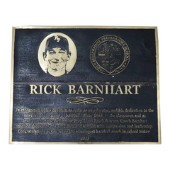 A black brass commemorative plaque, bronze dedication plaque