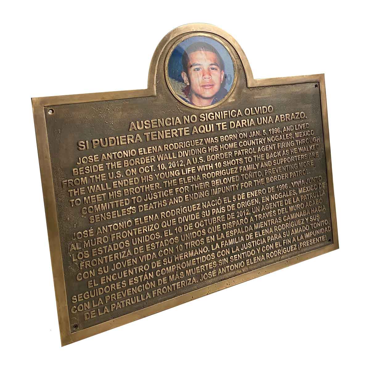 bronze memorial plaque with photo