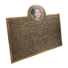 bronze memorial plaque with photo