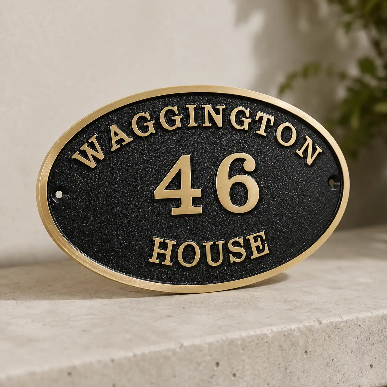 Custom oval brass address plaque for front door or gate