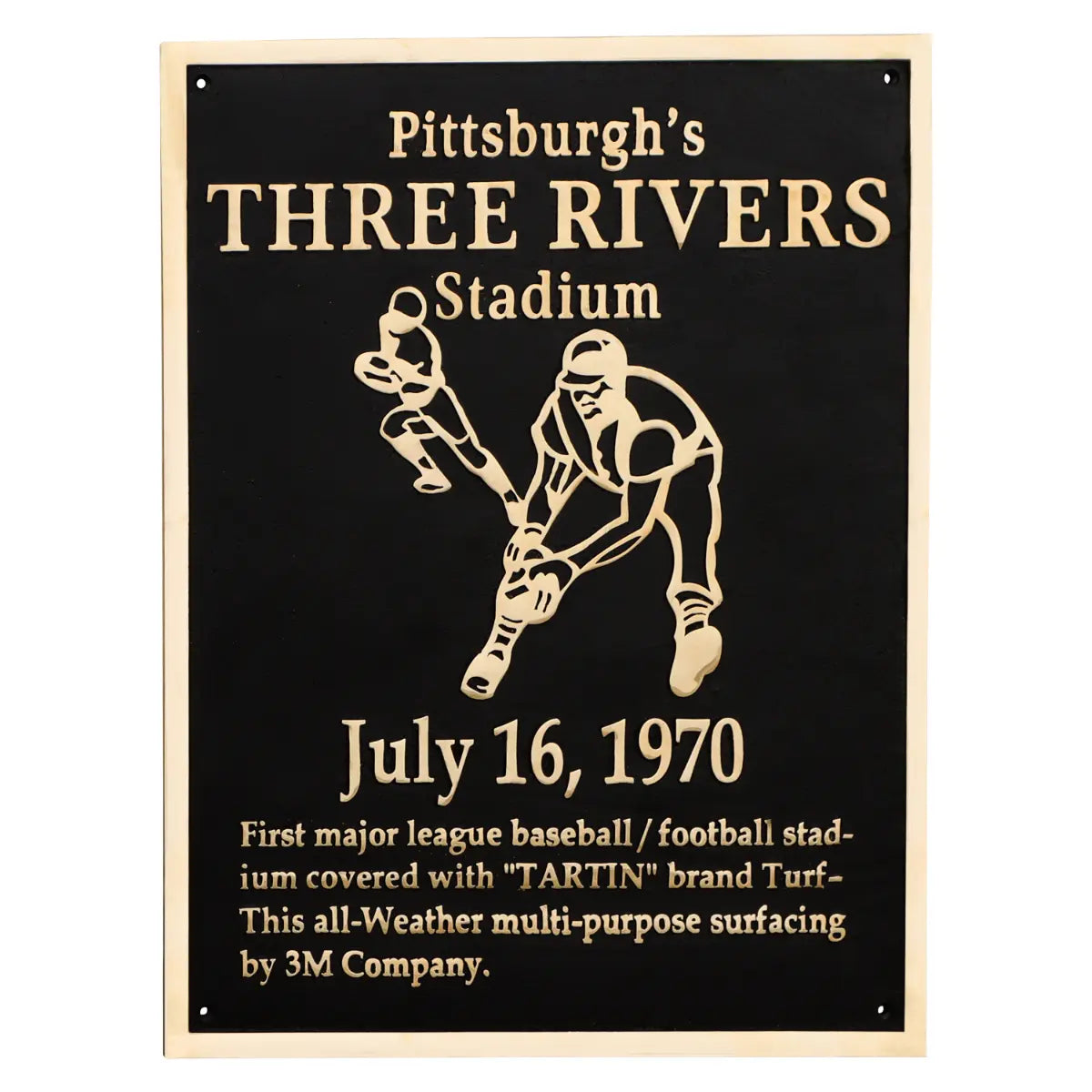 A black brass plaque with gold text, featuring an image of a baseball player and the text