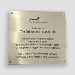 Brass plaque dedicated to Girl Scouts of Manhattan with engraved text, Brass plaque with personalized engraving