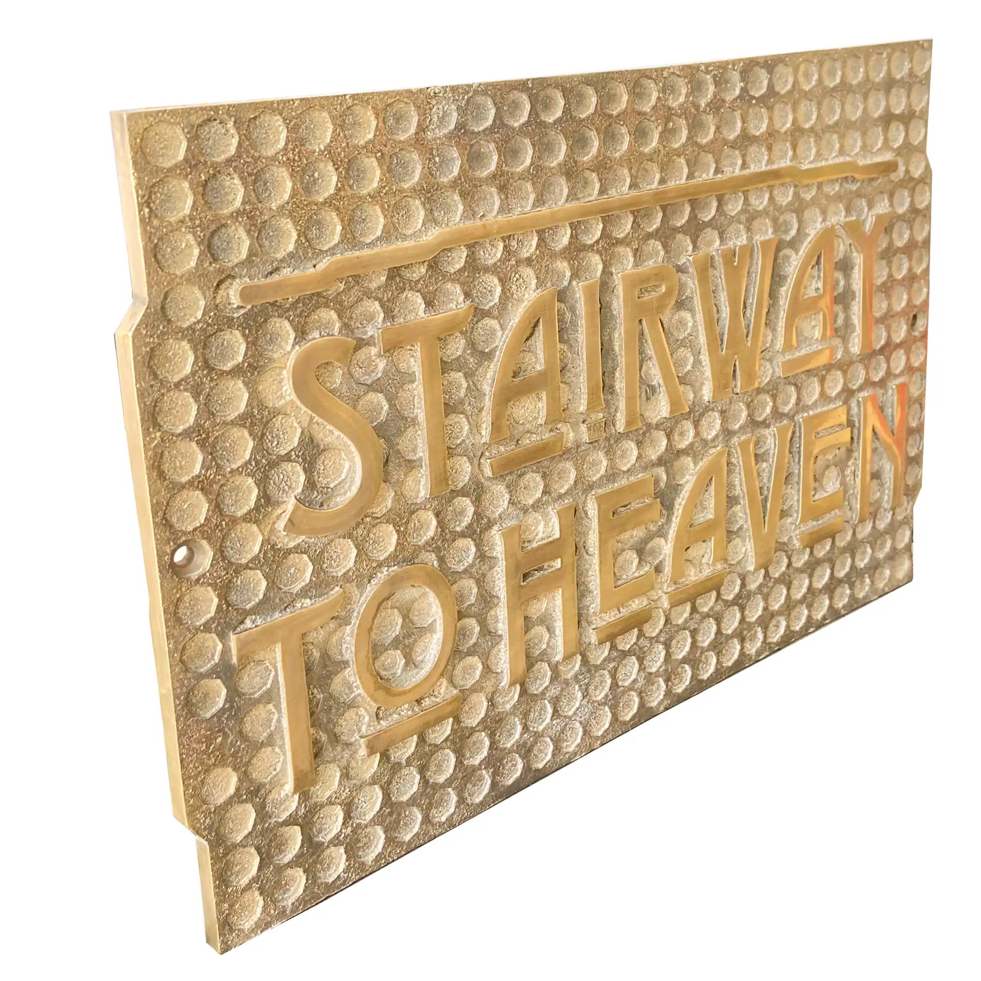 Antique brass plaque with decorative design