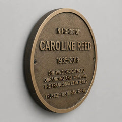 Bronze oval memorial plaque with custom name and dates