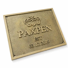 Custom brass wall plaque with engraved address information