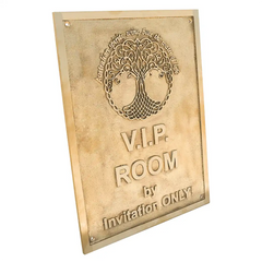 Custom brass plate for address: gold plaque with text and tree design on a white background