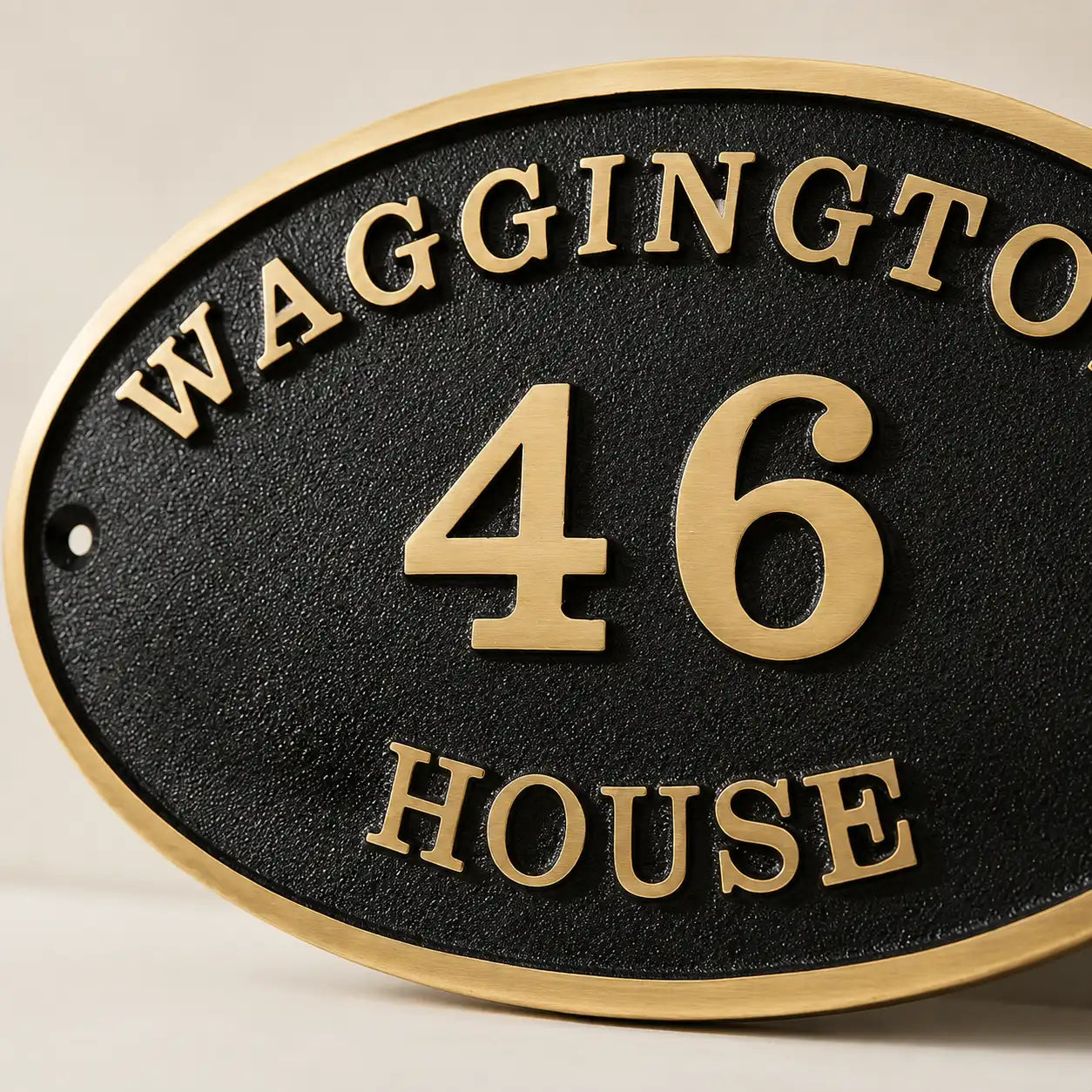 Decorative oval brass house number plaque with custom engraving