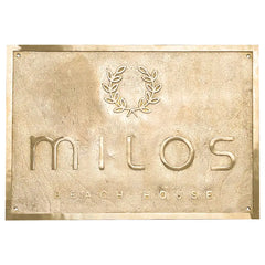 Engraved brass address sign with a brass gold finish 