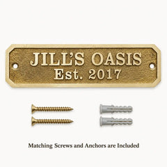 Custom Brass Address Sign displayed with two mounting screws and two wall anchors included for installation.