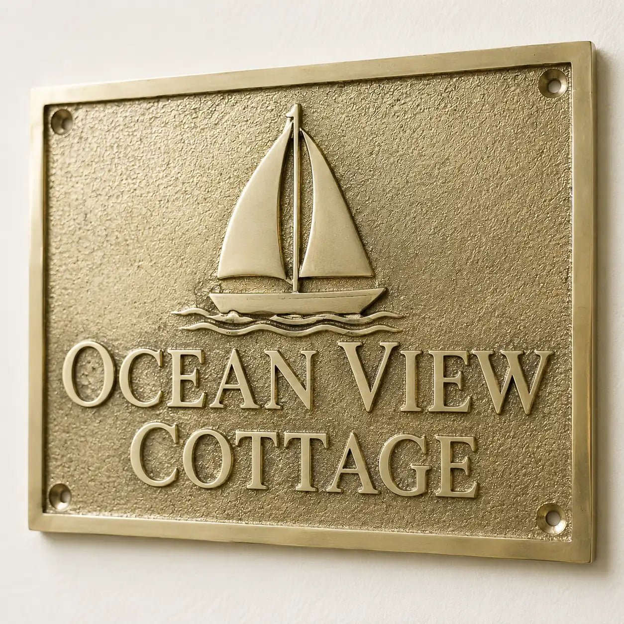 Engraved brass door plaque with gold background