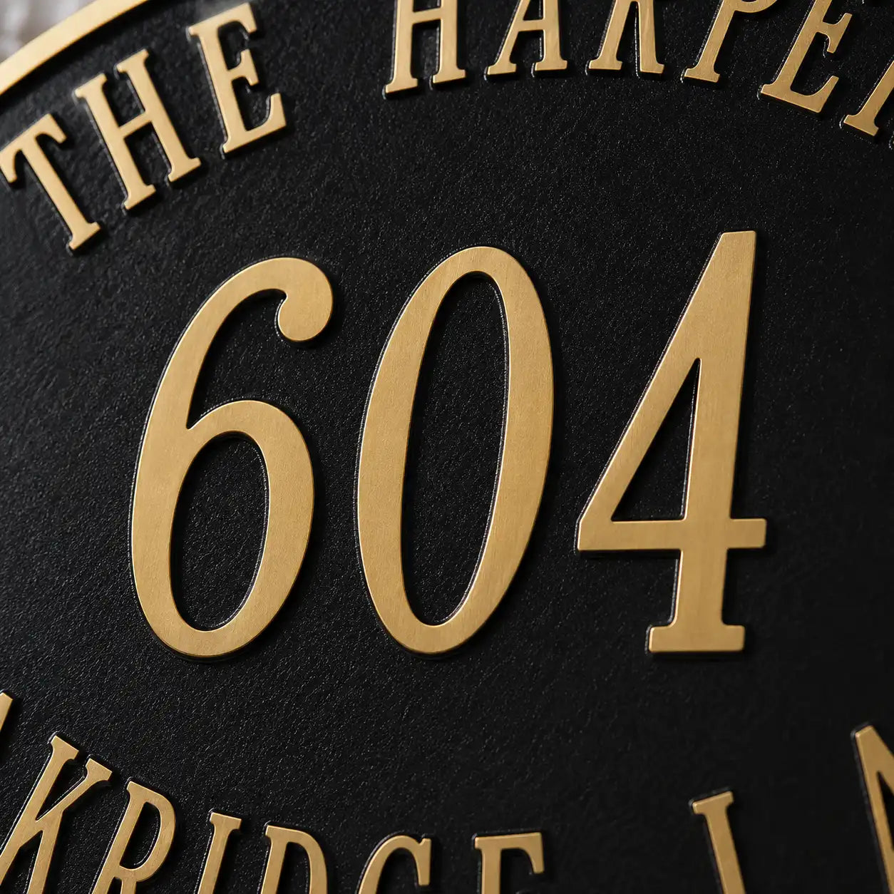 Custom oval bronze address plaque with personalized engraving