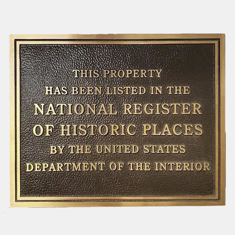 Custom historic plaque signage with text about listing in the National Register of Historic Places on a white background