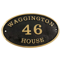 oval bronze address plaque with a dark background. Custom Brass Plaque 