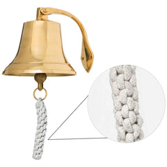traditional marine brass ship bell with rope