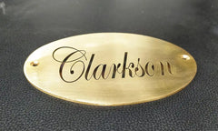 Engraved oval brass tag