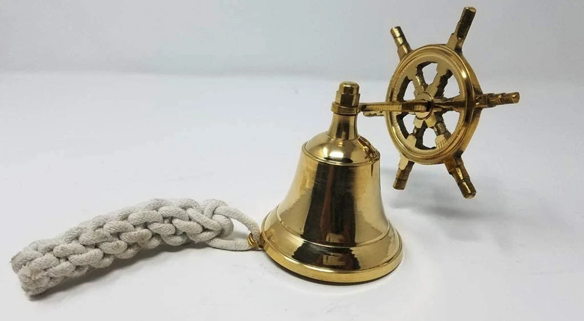 large brass ship wheel bell maritime décor