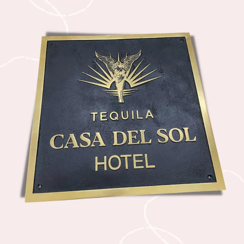 Black Background brass address plate with engraved text