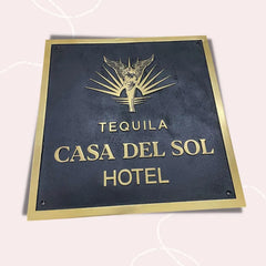 Black Background brass address plate with engraved text