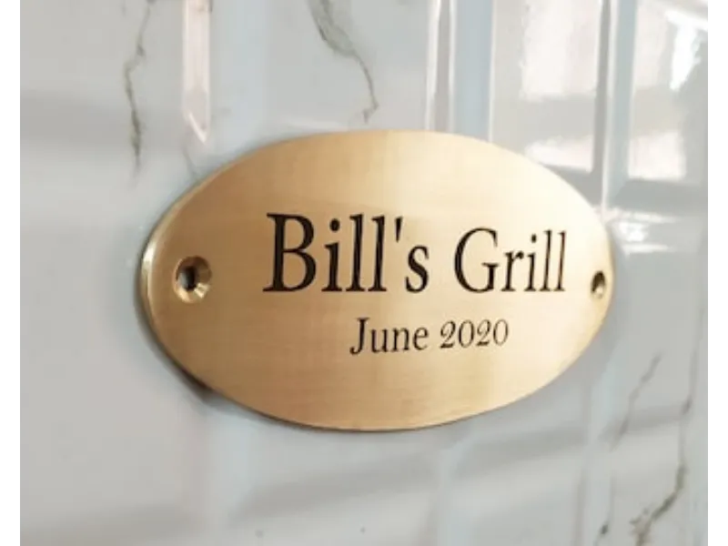 oval brass name and address sign